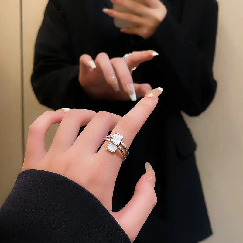 Trendy silver and gold ring in black heart shape