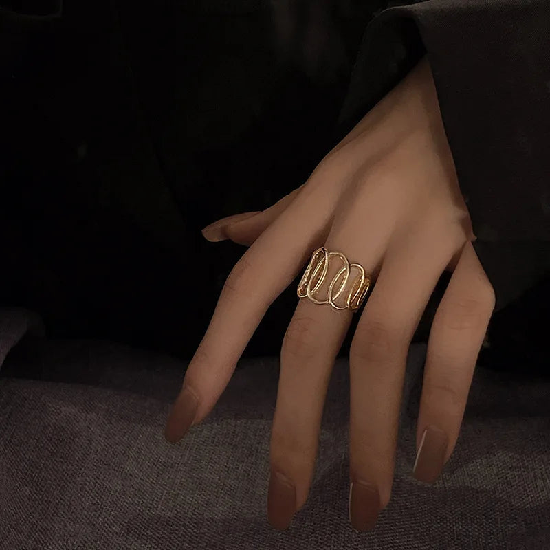 Trendy silver and gold ring in black heart shape