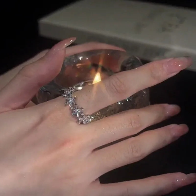 Trendy silver and gold ring in black heart shape