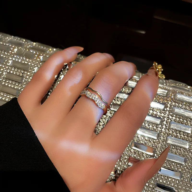 Trendy silver and gold ring in black heart shape