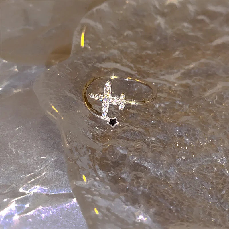 Trendy silver and gold ring in black heart shape
